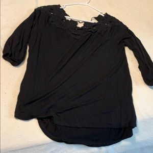black shirt with lace on the top